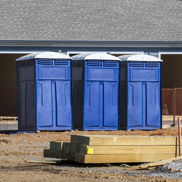 what is the cost difference between standard and deluxe porta potty rentals in Saukville